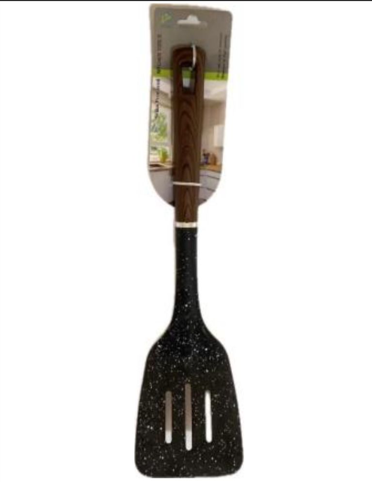 Pala/ espátula  ranurada en Nylon